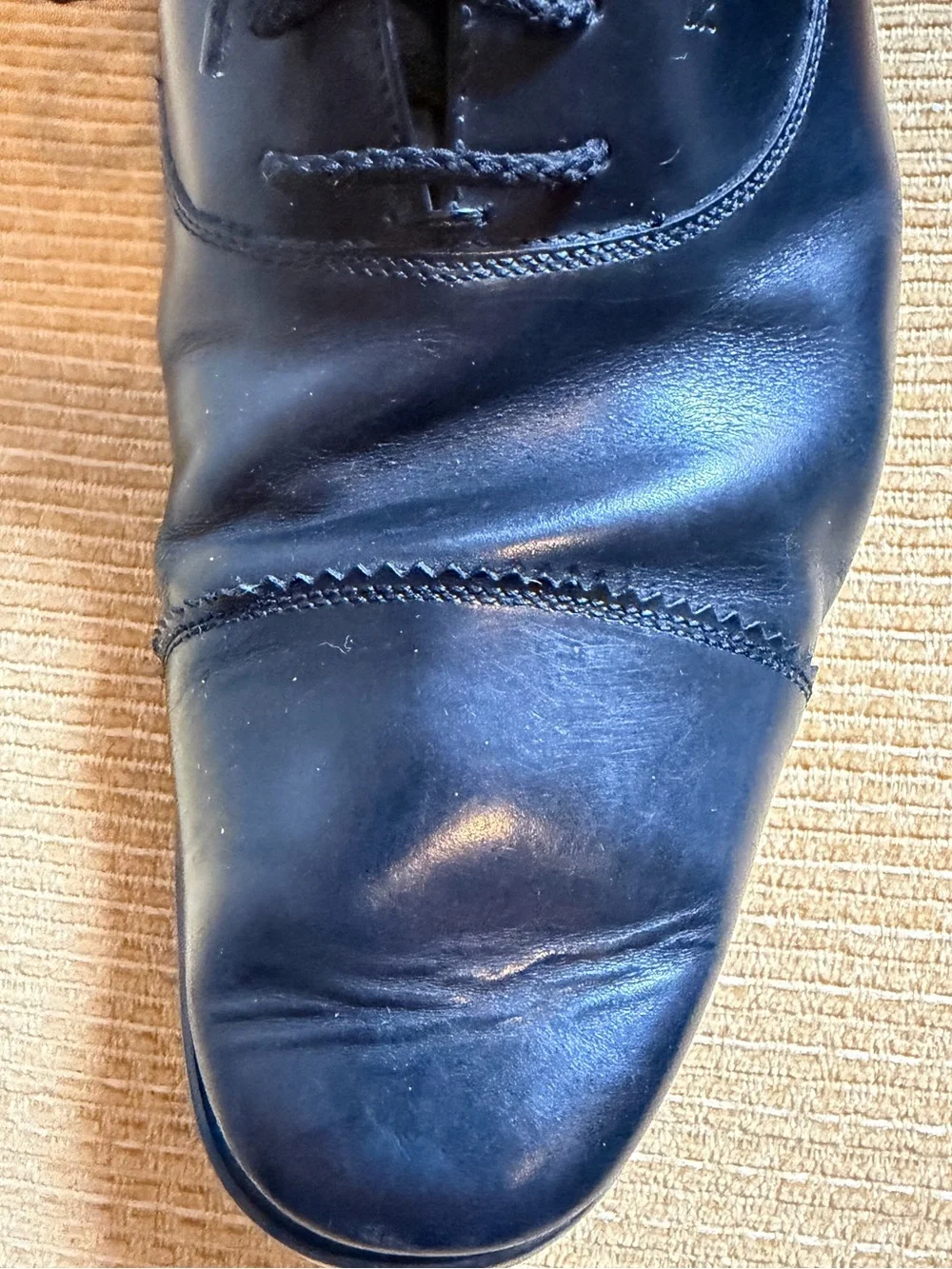 Salvatore Ferragamo black leather cap-toe oxford